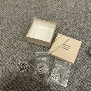 mimi designs 2 earrings and one necklace